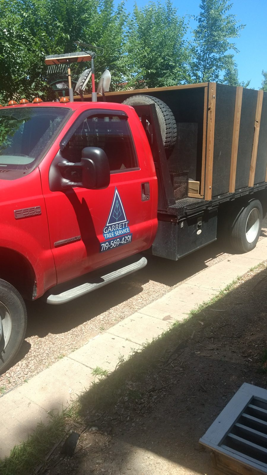 Garrett Tree Service chip truck on a job site